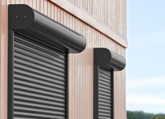 Roller shutters above a window