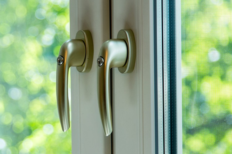 Window handles and locking elements